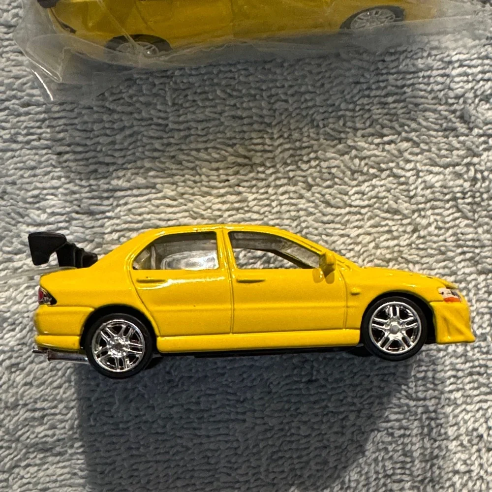 NWT ERTL Collectibles 2002 Mitsubishi Lancer Evolution Die Cast Model set of 2